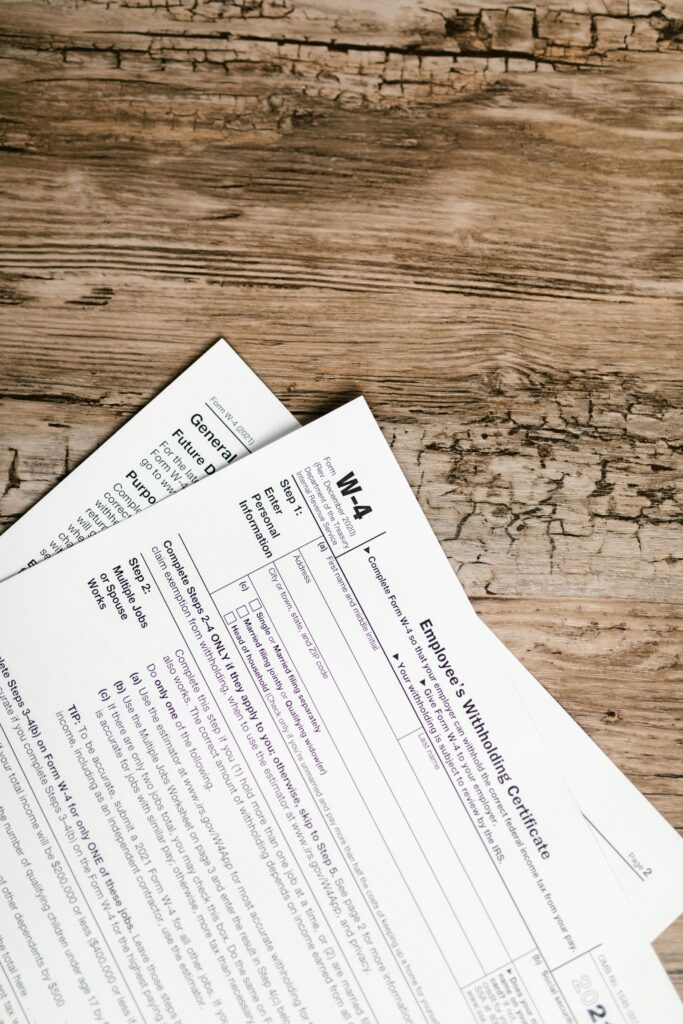 aerospace Detailed shot of tax forms on a wooden surface, ideal for concept themes like finance and documentation.